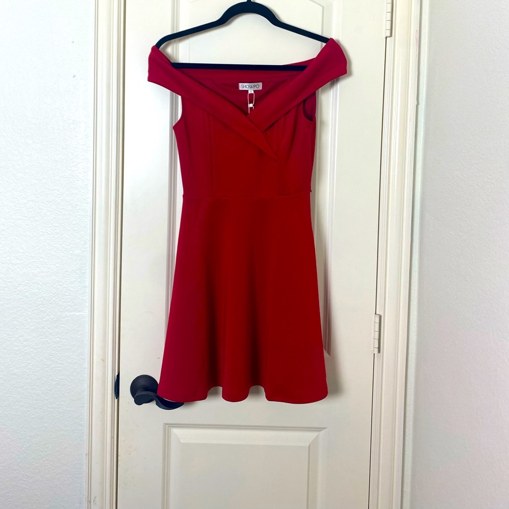 Simple but elegant Red off shoulder short dress.